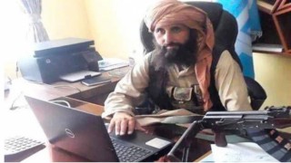 Afganistan’ın yeni Merkez Bankası Başkanının kalaşnikoflu skandal fotoğrafı yankı uyandırdı